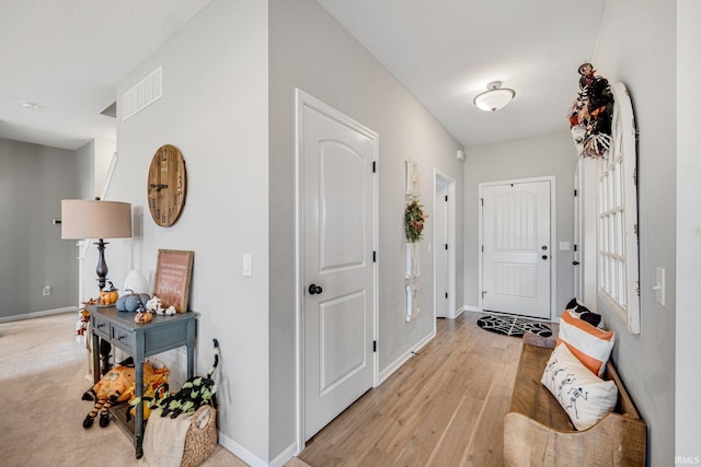 entrance foyer with light hardwood / wood-style floors