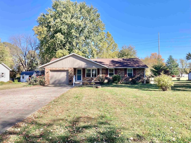 ranch-style home featuring a front lawn and a garage