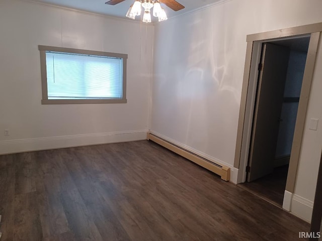 unfurnished room with baseboard heating, ceiling fan, dark hardwood / wood-style flooring, and ornamental molding