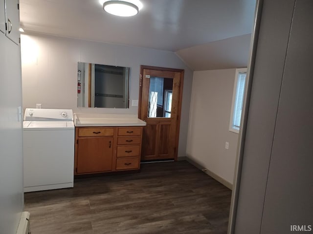 bathroom with hardwood / wood-style flooring, washer / dryer, lofted ceiling, and a baseboard heating unit