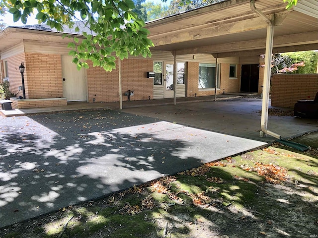 1031 Brentwood Dr, Evansville, IN 47715 - view of patio with a carport