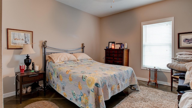 bedroom with multiple windows