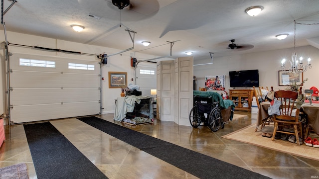 garage with visible vents and ceiling fan