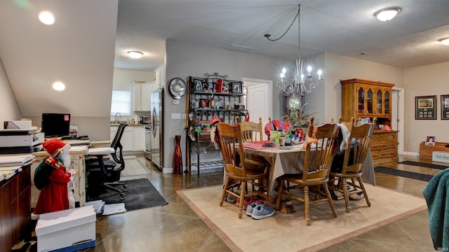 dining space with an inviting chandelier and visible vents