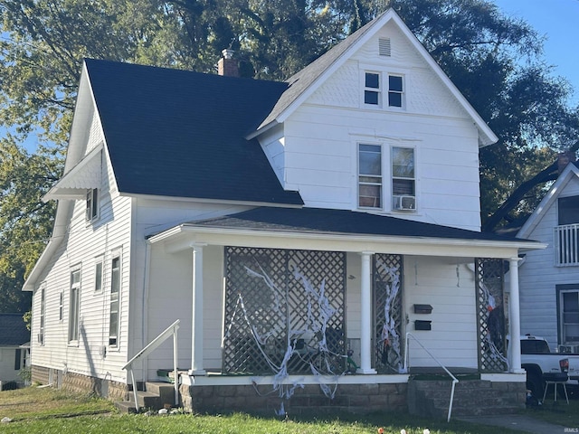 view of front facade featuring cooling unit