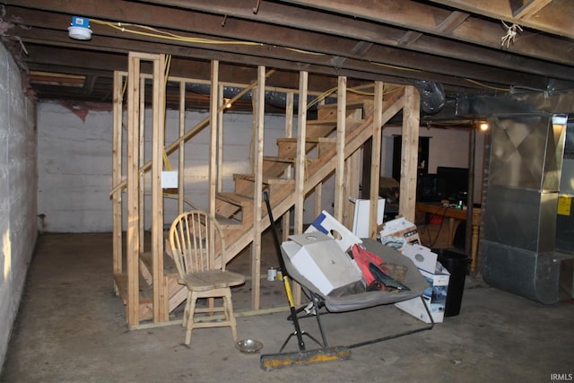 basement featuring heating unit