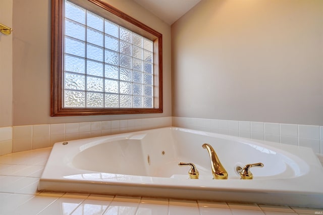 bathroom featuring a relaxing tiled tub