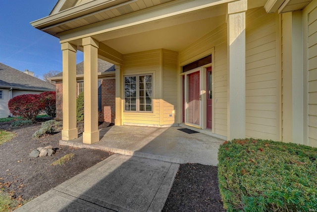 doorway to property featuring a patio