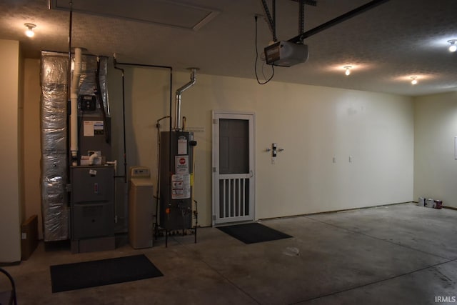 garage featuring water heater and a garage door opener