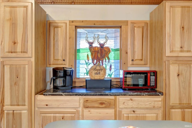 kitchen featuring light brown cabinets