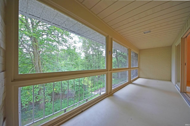 unfurnished sunroom featuring a healthy amount of sunlight