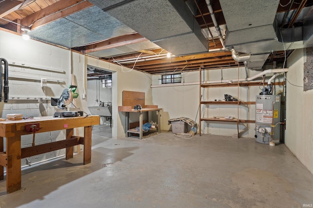 basement with sink and gas water heater