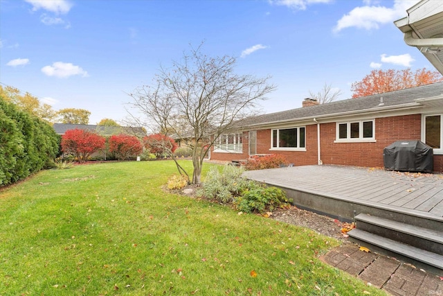 view of yard with a deck