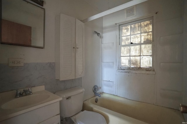 full bathroom featuring vanity, shower / bathing tub combination, and toilet