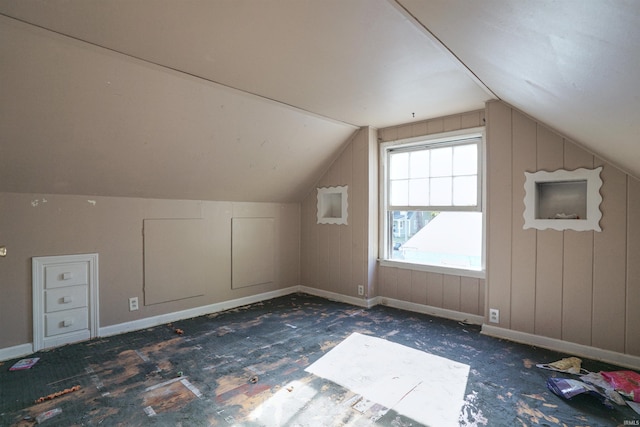 additional living space with lofted ceiling