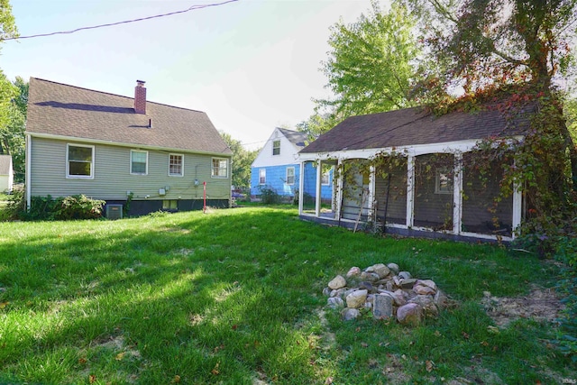 view of yard with central AC unit