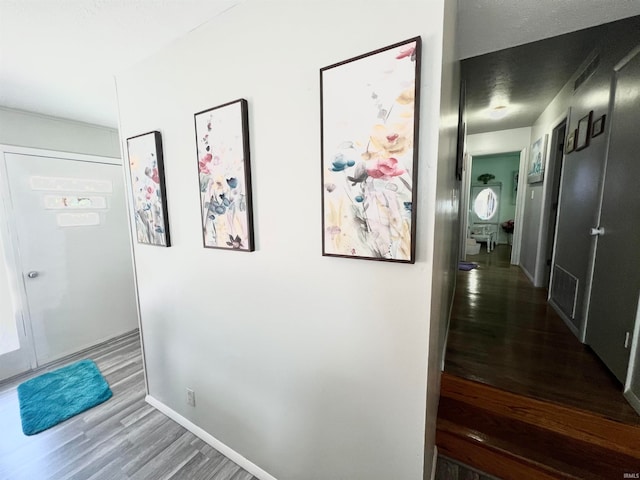 hall featuring hardwood / wood-style flooring