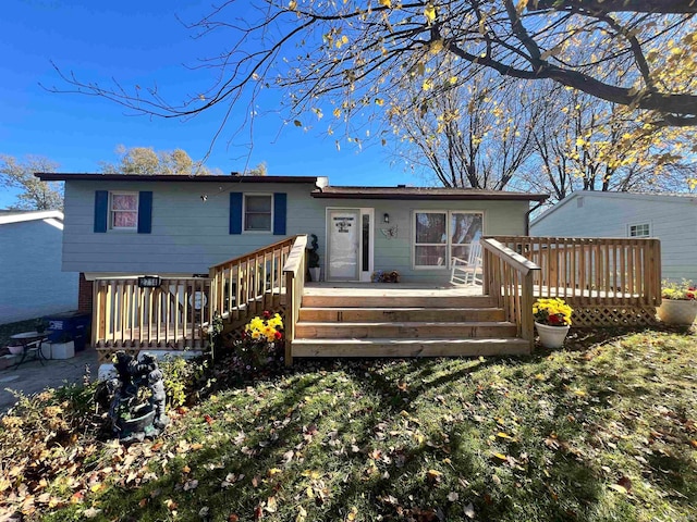 rear view of house with a deck