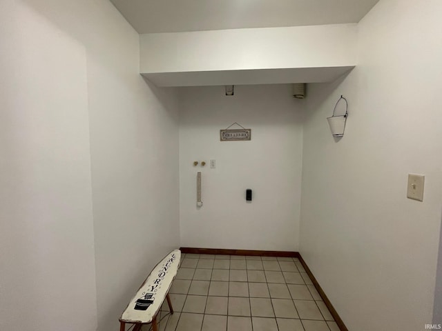 laundry area featuring light tile patterned flooring