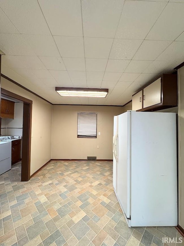 kitchen featuring white fridge