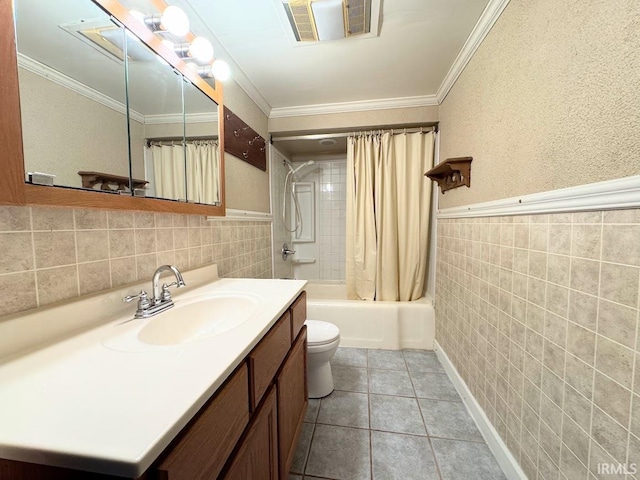 full bathroom with tile patterned floors, toilet, crown molding, shower / tub combo with curtain, and vanity