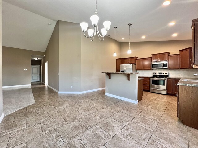 1793 Breckenridge Pass, Fort Wayne, IN 46845 - kitchen with stainless steel appliances, high vaulted ceiling, a sink, and baseboards