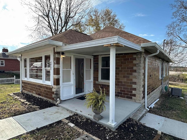 view of front of property with cooling unit