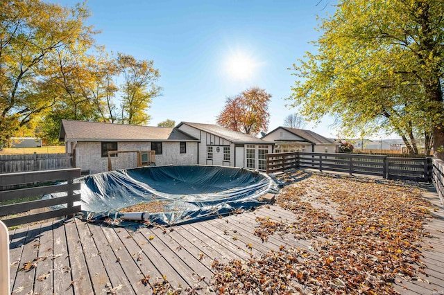 exterior space featuring a wooden deck