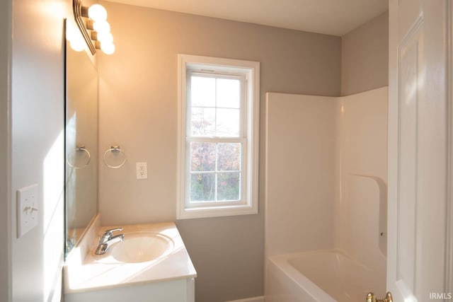 bathroom with vanity and shower / bathtub combination