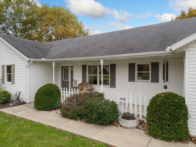 doorway to property with covered porch