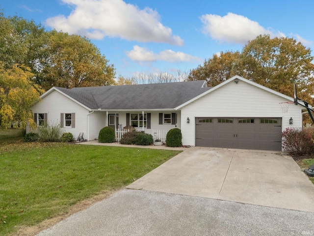 ranch-style home with covered porch, a front lawn, and a garage