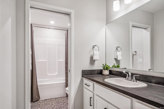 full bathroom with vanity, toilet, and shower / bathtub combination with curtain