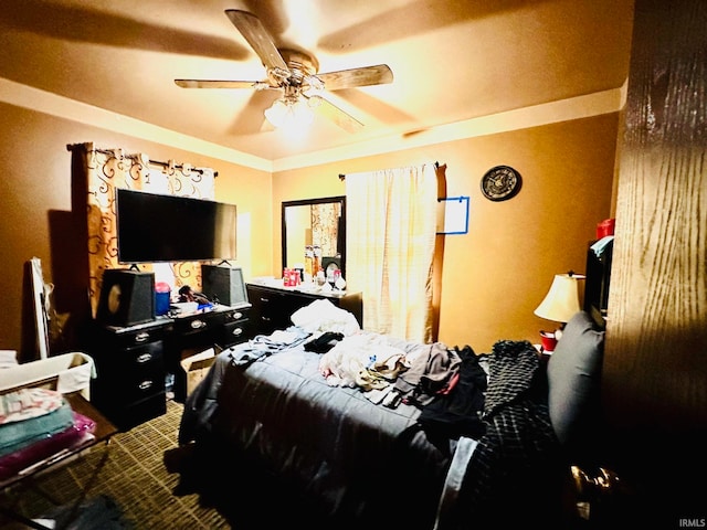 bedroom featuring ceiling fan