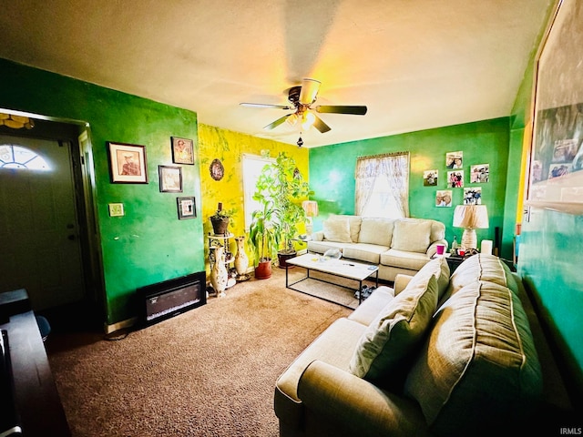 carpeted living room featuring ceiling fan