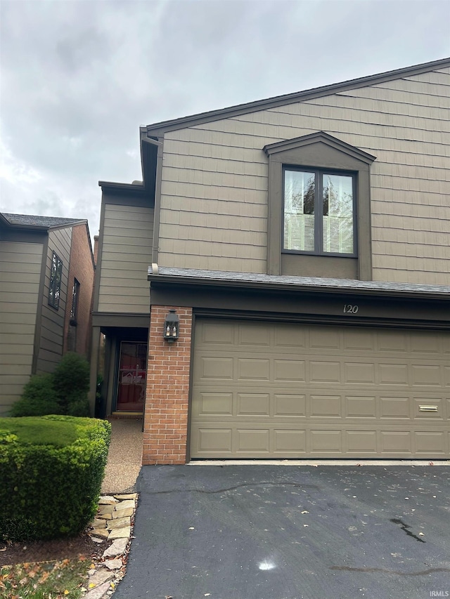 view of property featuring a garage