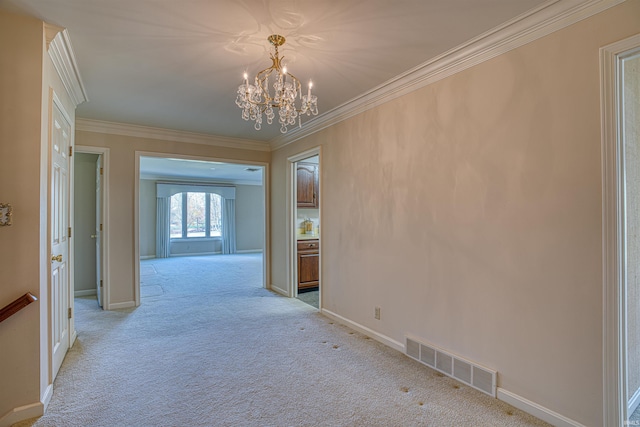 hall featuring light carpet, a chandelier, and crown molding