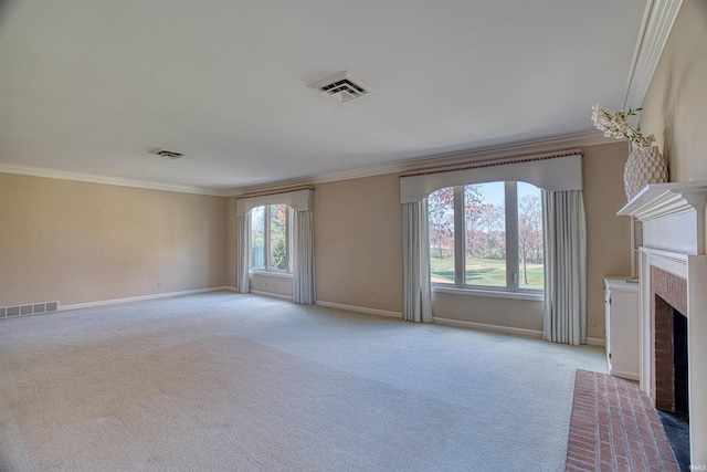 unfurnished living room featuring crown molding, light carpet, and a brick fireplace