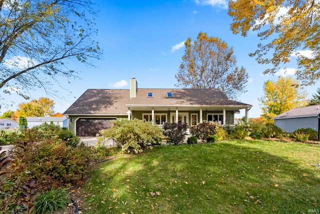 back of house featuring a yard