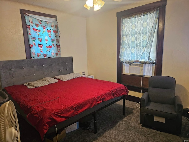 carpeted bedroom featuring cooling unit and ceiling fan