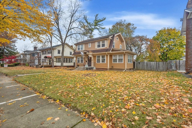 view of front facade featuring a front yard