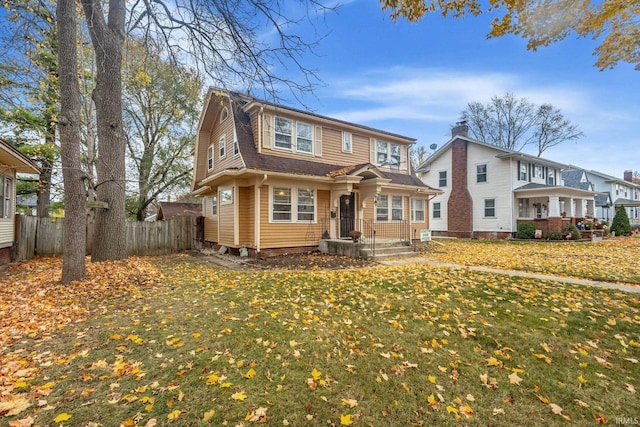 view of front of home with a front lawn