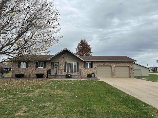 ranch-style home featuring a garage and a front lawn