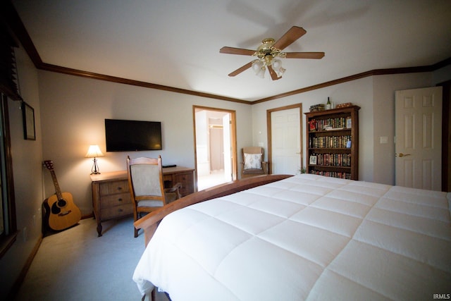 bedroom featuring crown molding, carpet flooring, and ceiling fan