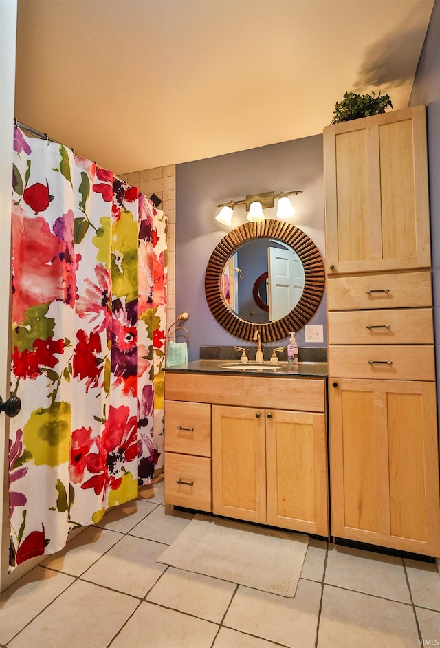 bathroom with vanity and tile patterned floors