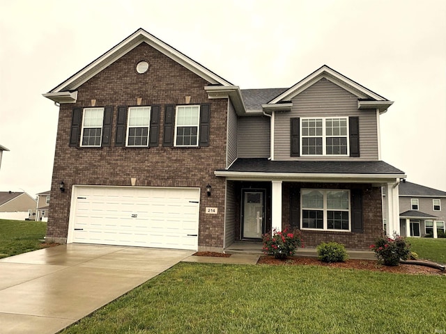 view of front of house featuring an attached garage, a front lawn, brick siding, and driveway