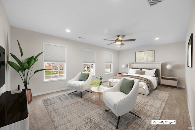 carpeted bedroom featuring ceiling fan