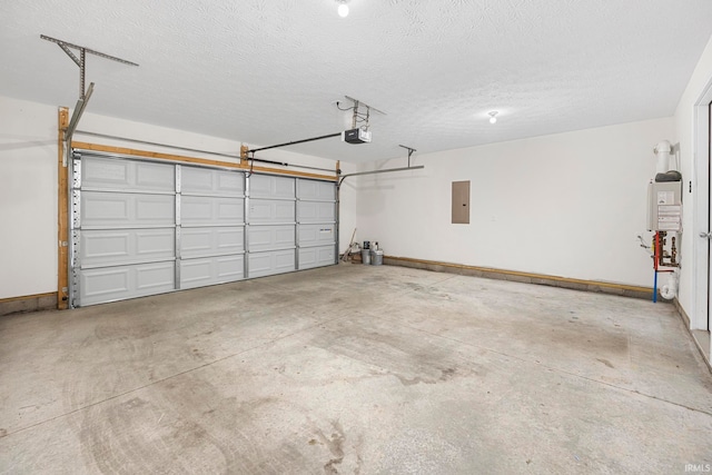 garage featuring electric panel and a garage door opener