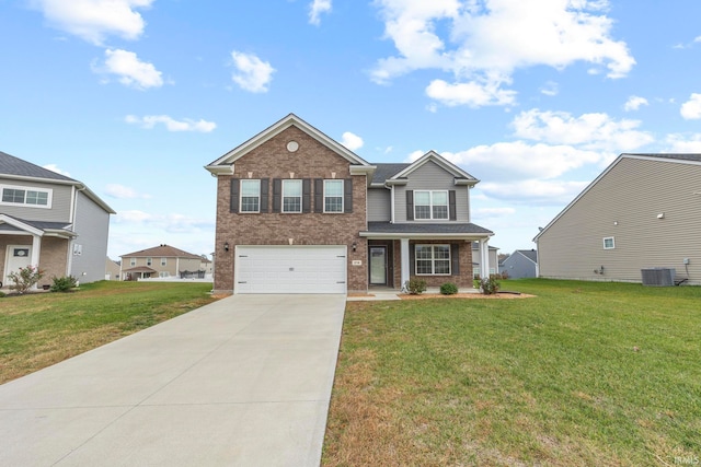 view of front of house with a garage, cooling unit, and a front lawn