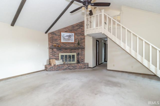 unfurnished living room with ceiling fan, beam ceiling, carpet flooring, high vaulted ceiling, and a fireplace