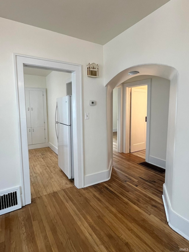 hall featuring hardwood / wood-style flooring